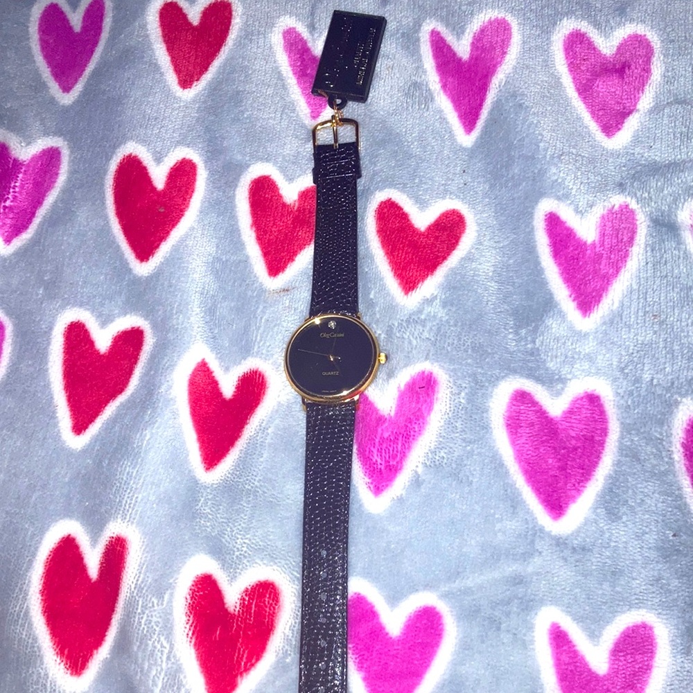 I’m selling my brand new Oleg Cassini watch